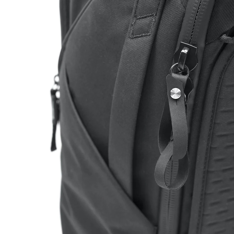 Close-up side view of a Peak Design Travel Backpack