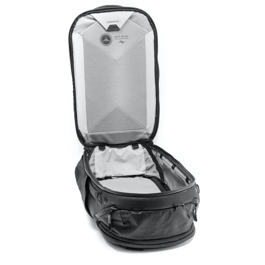 Open view of a Peak Design Travel Backpack showing main compartments