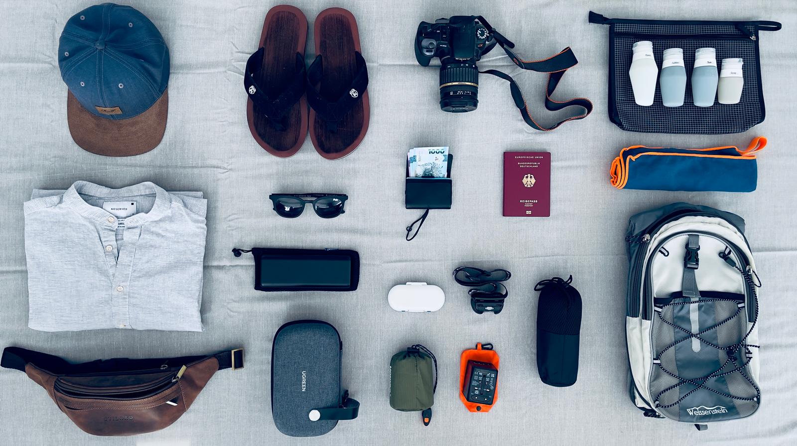 Essential travel items packed for a trip to the Philippines