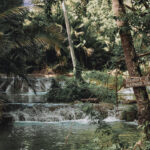 Hidden waterfalls in the jungle of Siquijor, Philippines – a serene and natural paradise surrounded by lush greenery.